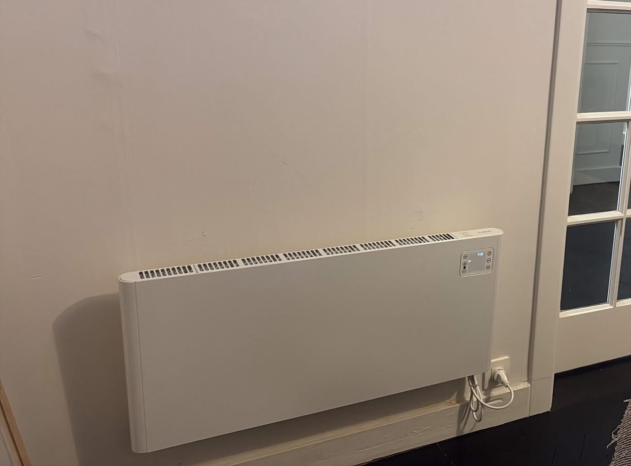 Installation radiateur électrique mural à Liège - TS Pro-Tech